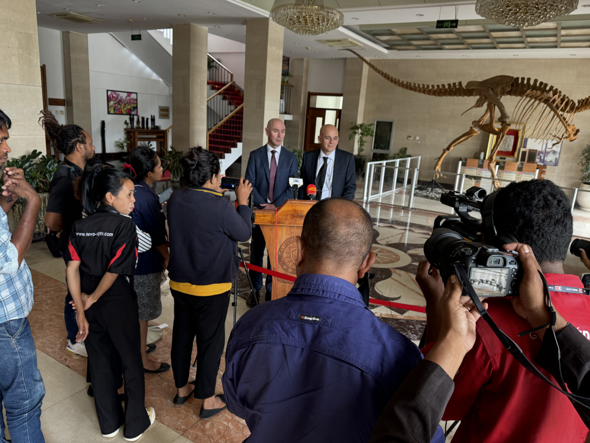 Greg Leslie and Jes Sammut present to the Timorese media