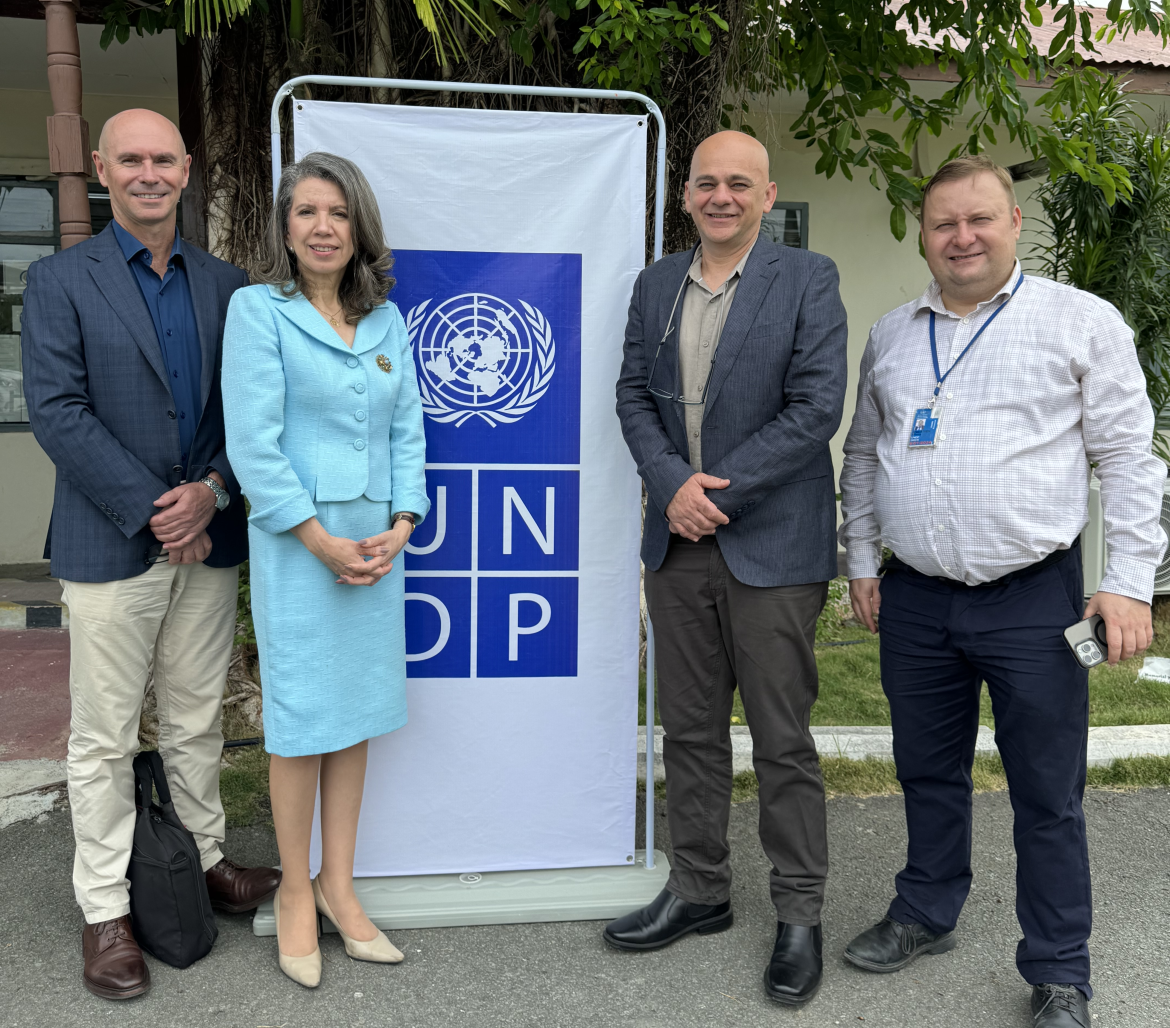 Greg Leslie and Jes Sammut with representatives from the UNDP