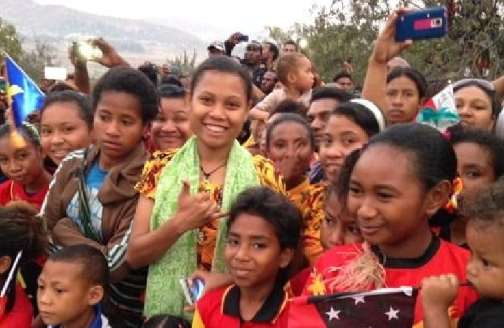 A group of smiling Papua New Guinean people
