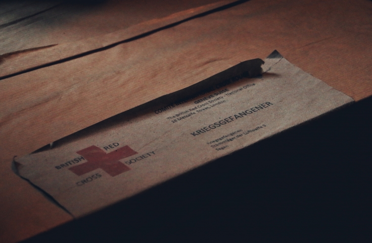 An old envelope has a letter enclosed with the British Society of the Red Cross logo.